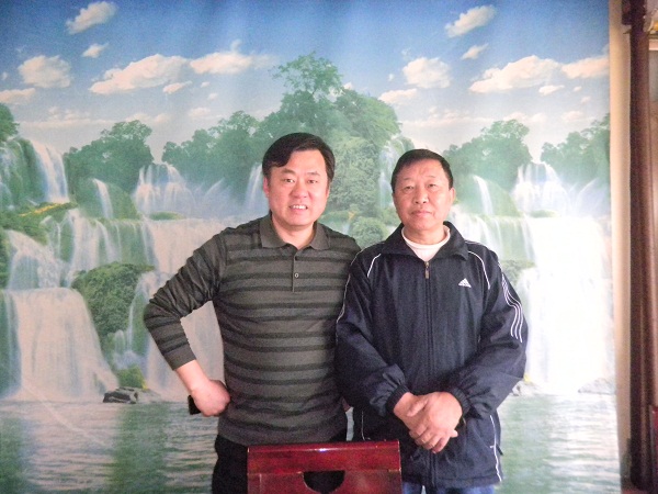 邵阳经委主任、市长助理秦立军(左)与我司经济发展战略顾问韩国良先生(右)